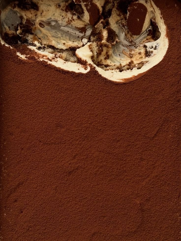 Dessert al cioccolato con cacao in superficie